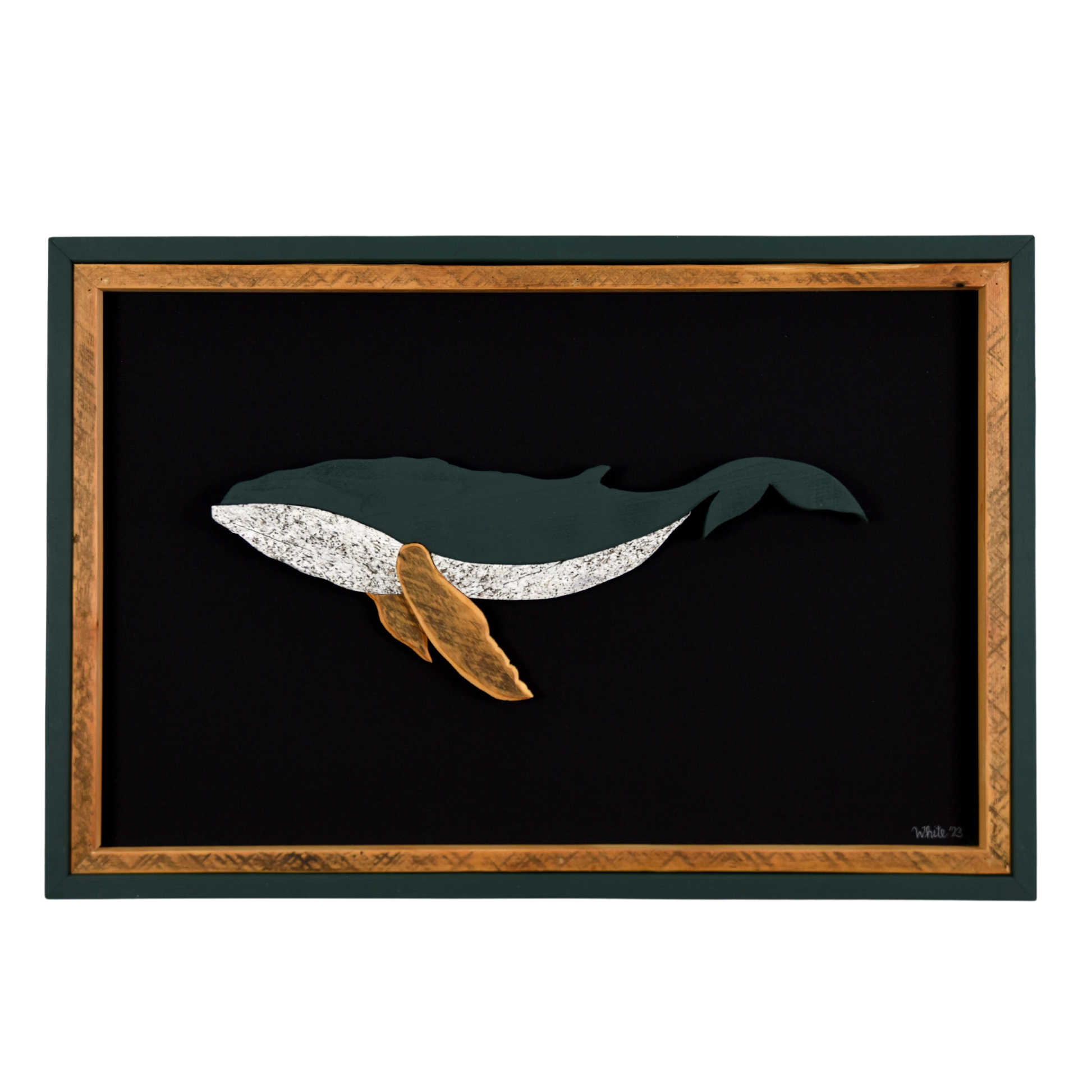 The Humpback showcases a humpback whale made from reclaimed wood and driftwood with green exterior frame, brown tone wood interior trim and fins, and a black canvas.