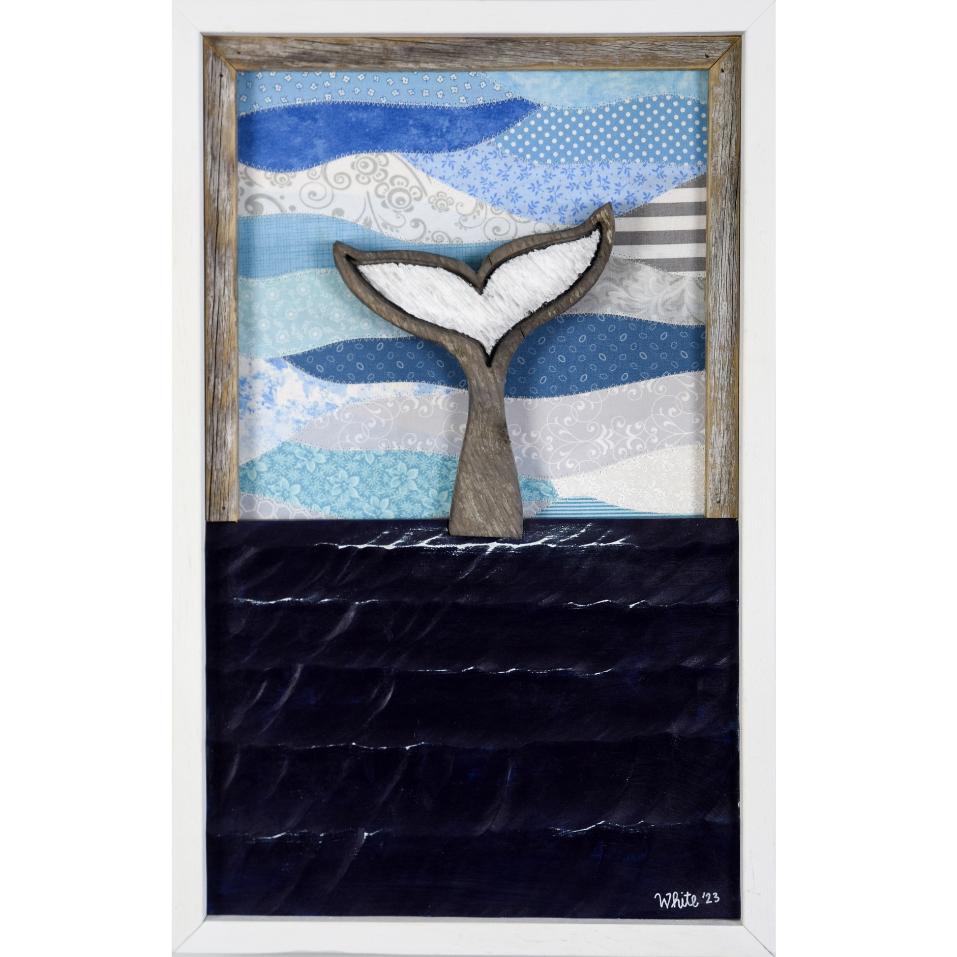 Shop for Newfoundland driftwood art at The White's Emporium. This mixed-media piece shows a whale tail diving into the water against a quilted fabric sky.