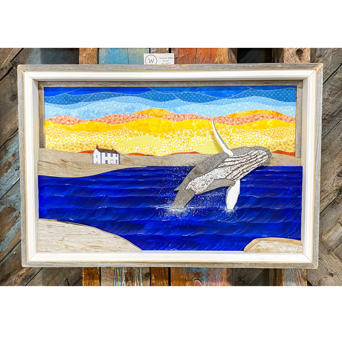 "The Breach - Quilted Edition" is a mixed-media artwork. This piece is made of quilted fabric carved wood, driftwood and reclaimed wood.