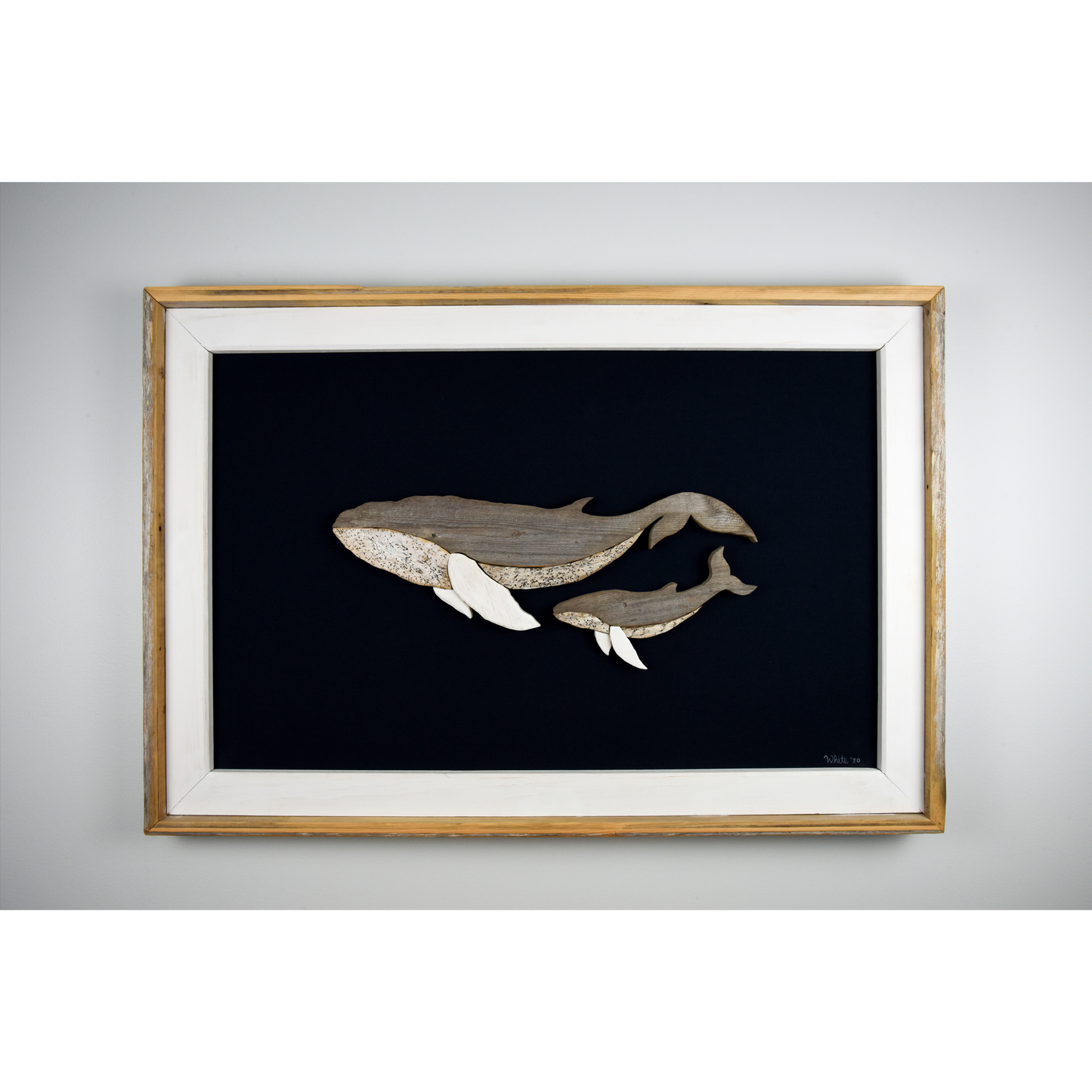 The White's Emporium's "The Mother" driftwood art piece features two humpback whales made from reclaimed wood and driftwood sourced in Newfoundland.