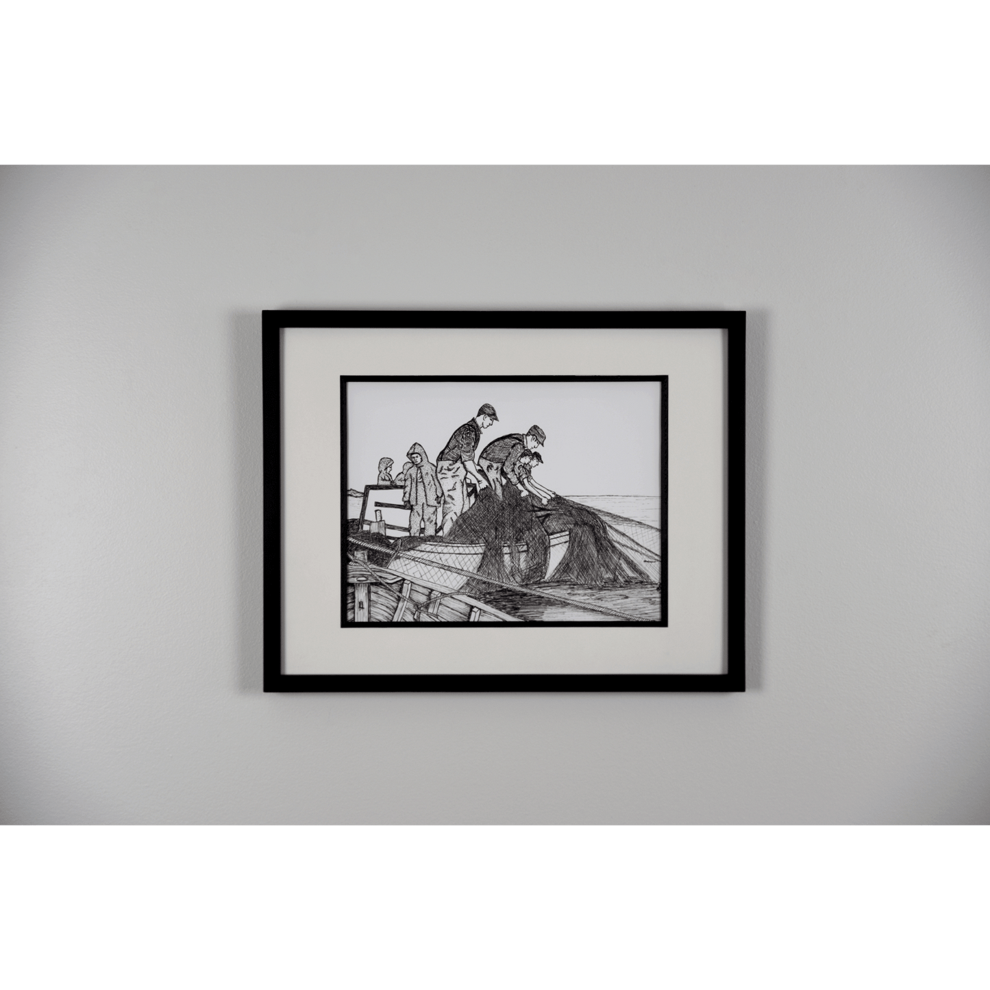 Add a touch of rustic charm with "The Haul" reproduction print. This pen and ink print features fishermen hauling their nets to the boat.