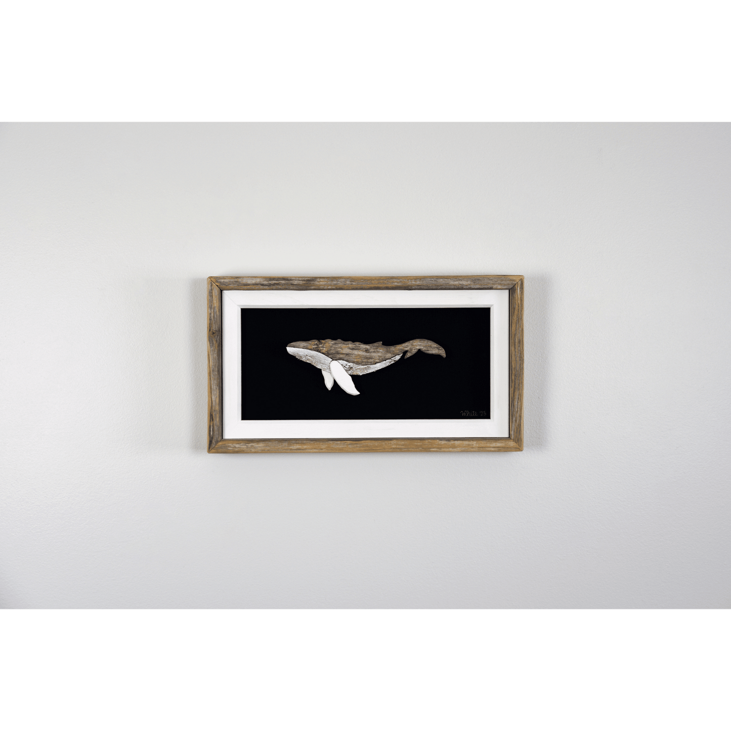 "The Humpback" by The White's Emporium is a mixed media artwork made from various woods and fabric featuring a humpback whale.