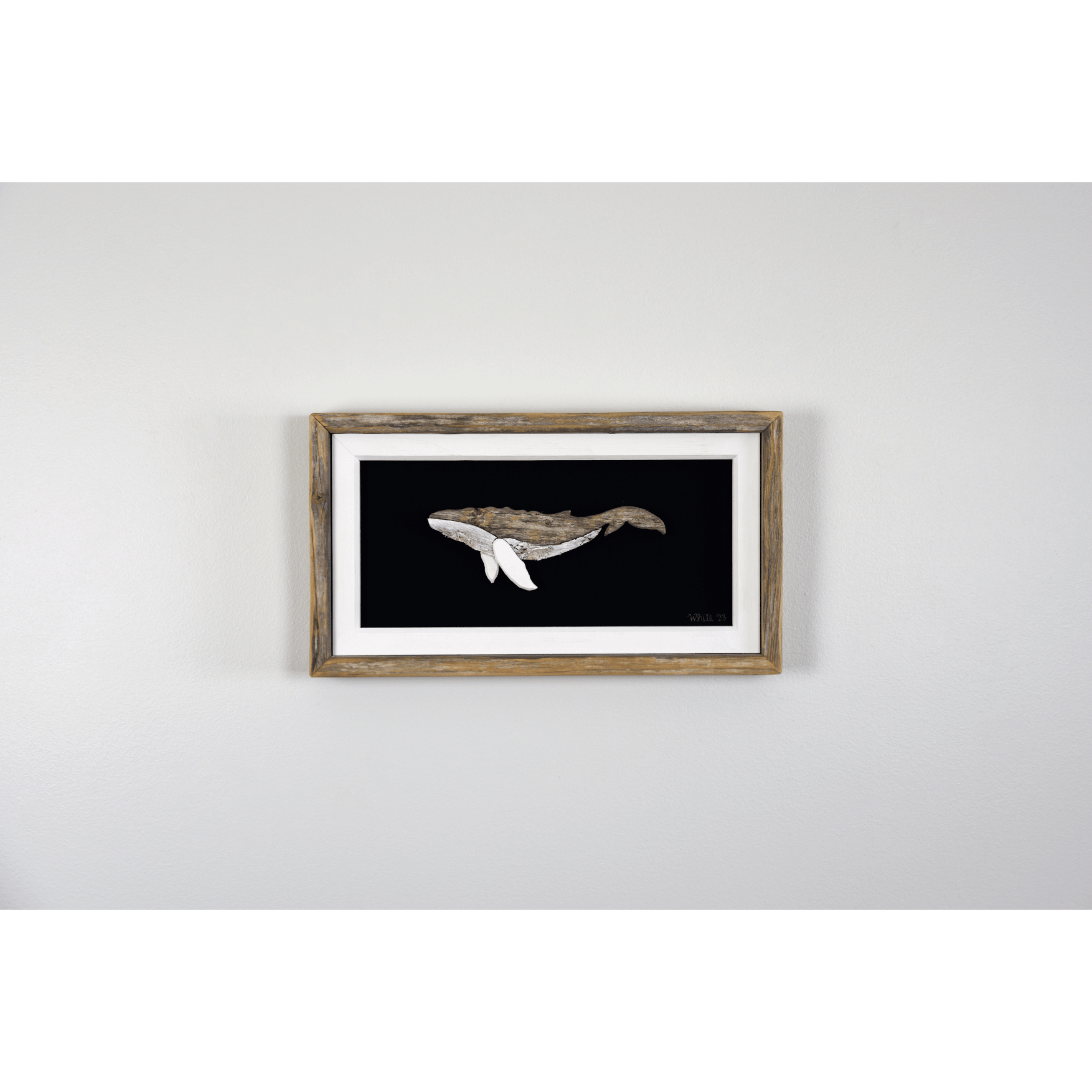 "The Humpback" by The White's Emporium is a mixed media artwork made from various woods and fabric featuring a humpback whale.