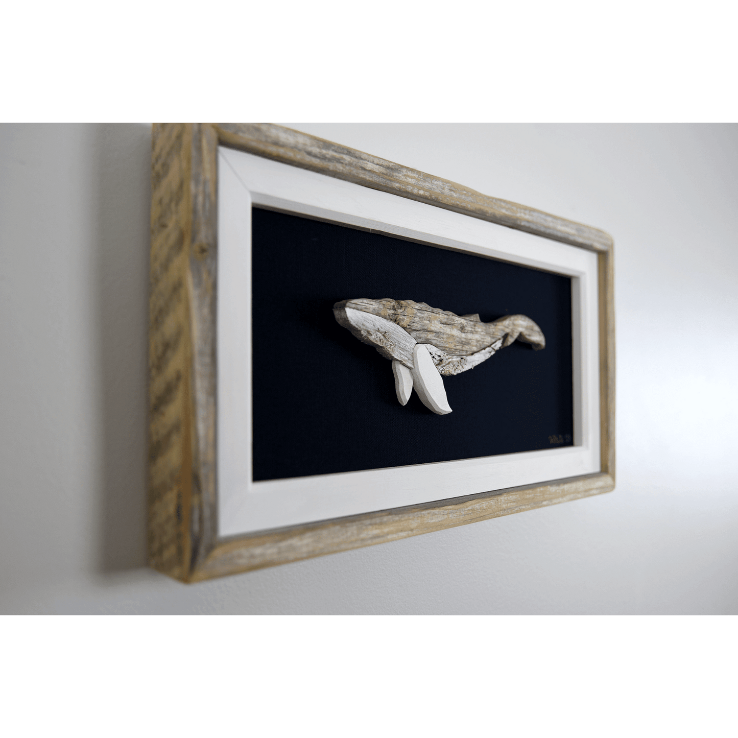 "The Humpback" by The White's Emporium is a mixed media artwork made from various woods and fabric featuring a humpback whale.
