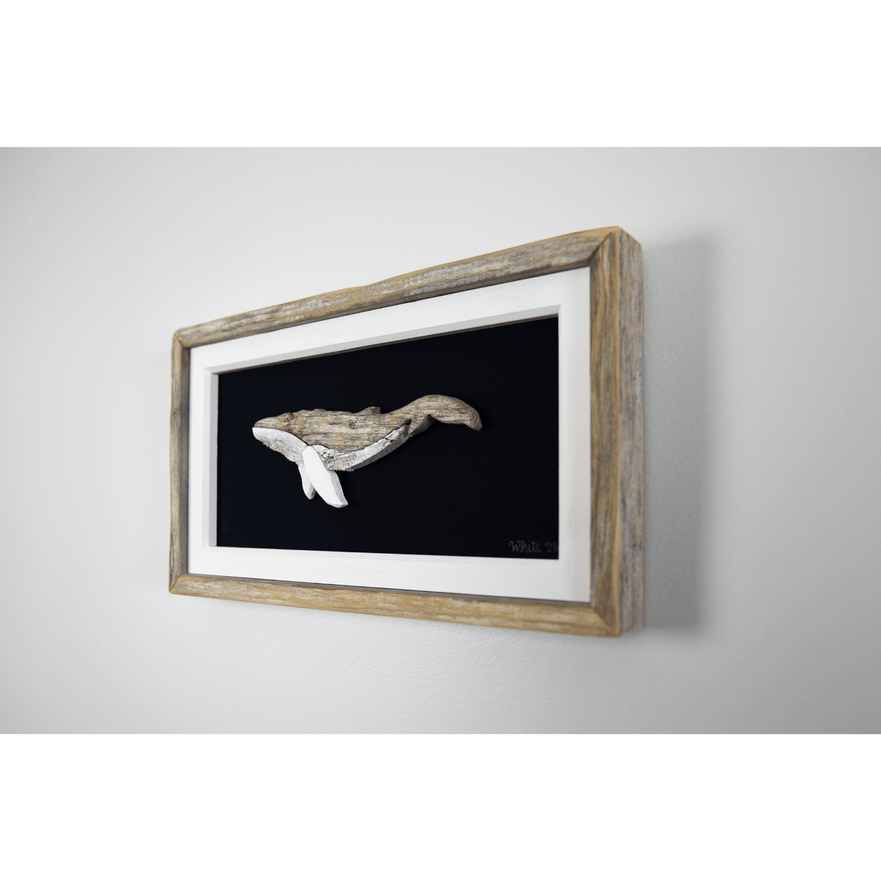 "The Humpback" by The White's Emporium is a mixed media artwork made from various woods and fabric featuring a humpback whale.