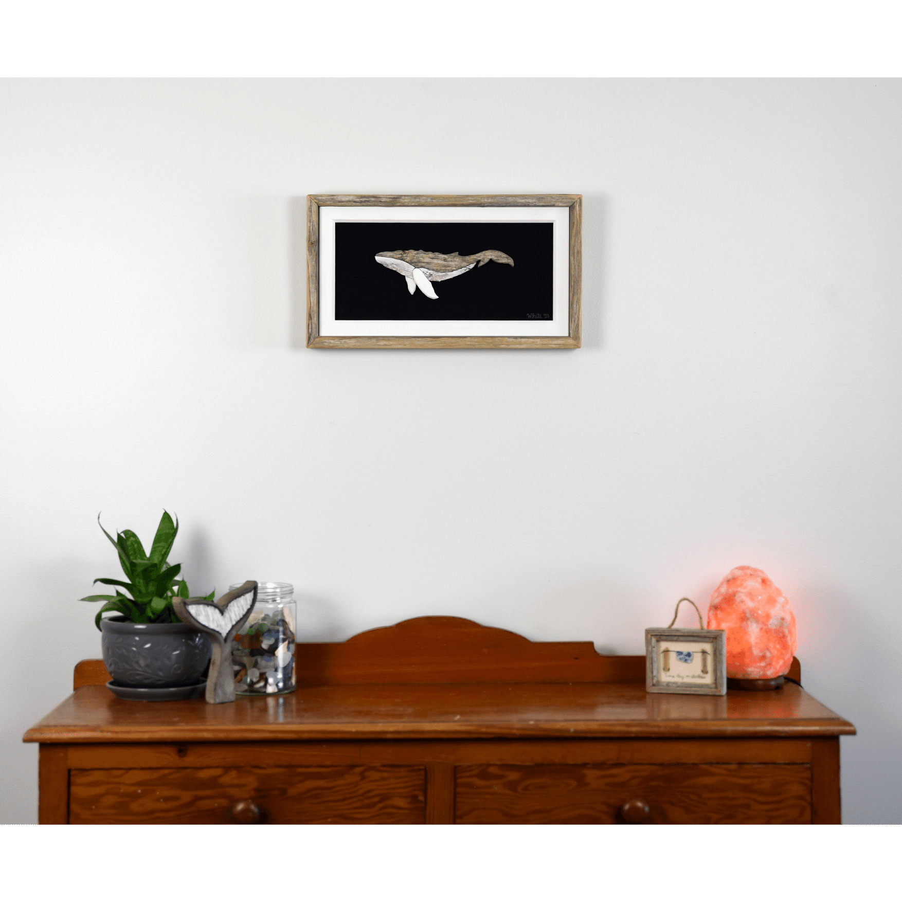 "The Humpback" by The White's Emporium is a mixed media artwork made from various woods and fabric featuring a humpback whale.