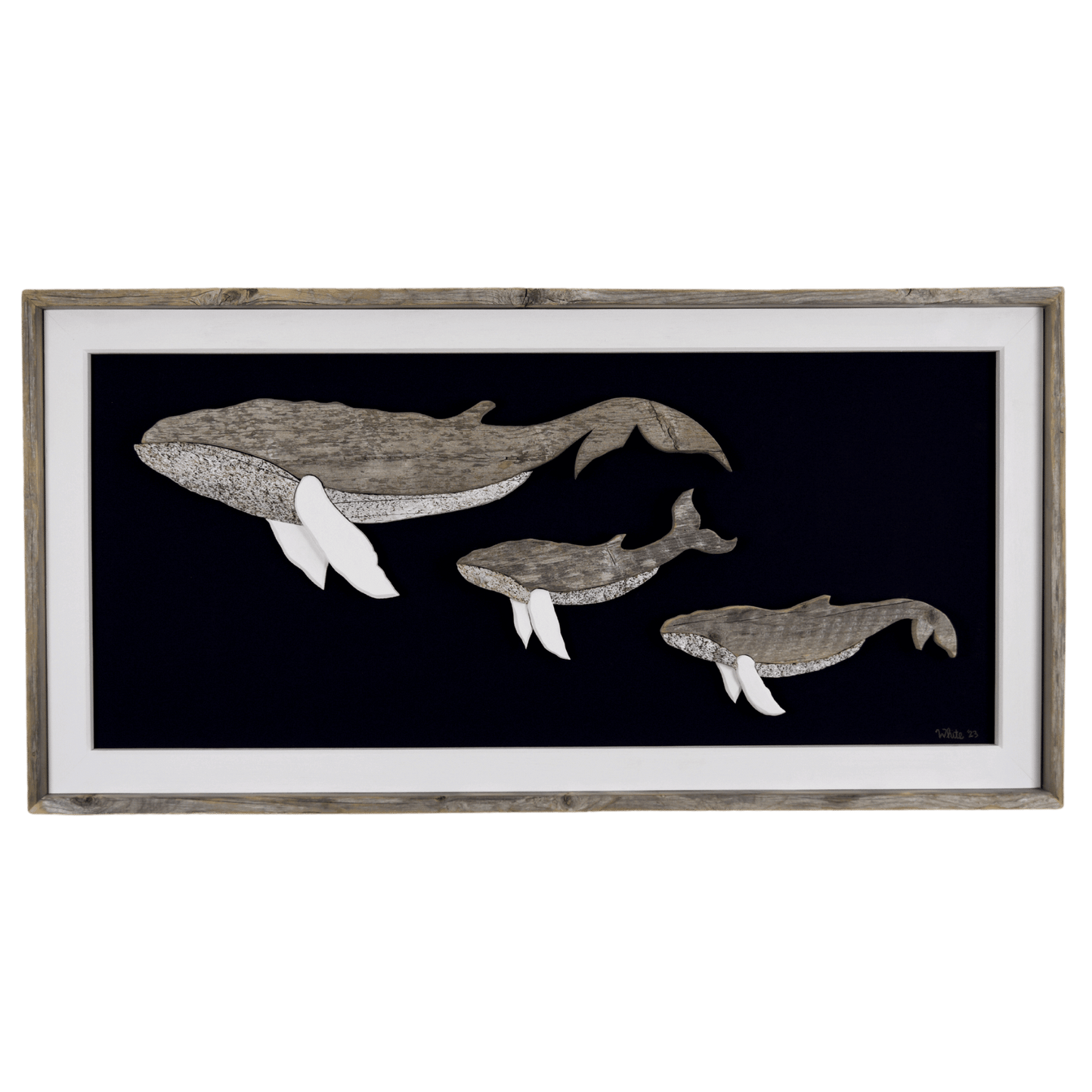 The White's Emporium's driftwood art piece features three humpback whales, a mother and 2 calves, made from reclaimed wood and driftwood sourced in Newfoundland.