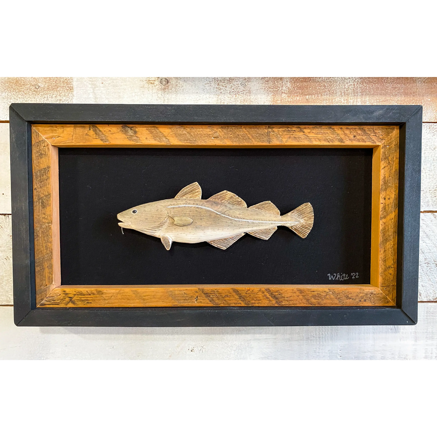 "The Cod Fish" is an original driftwood mixed-media art piece of a cod fish.