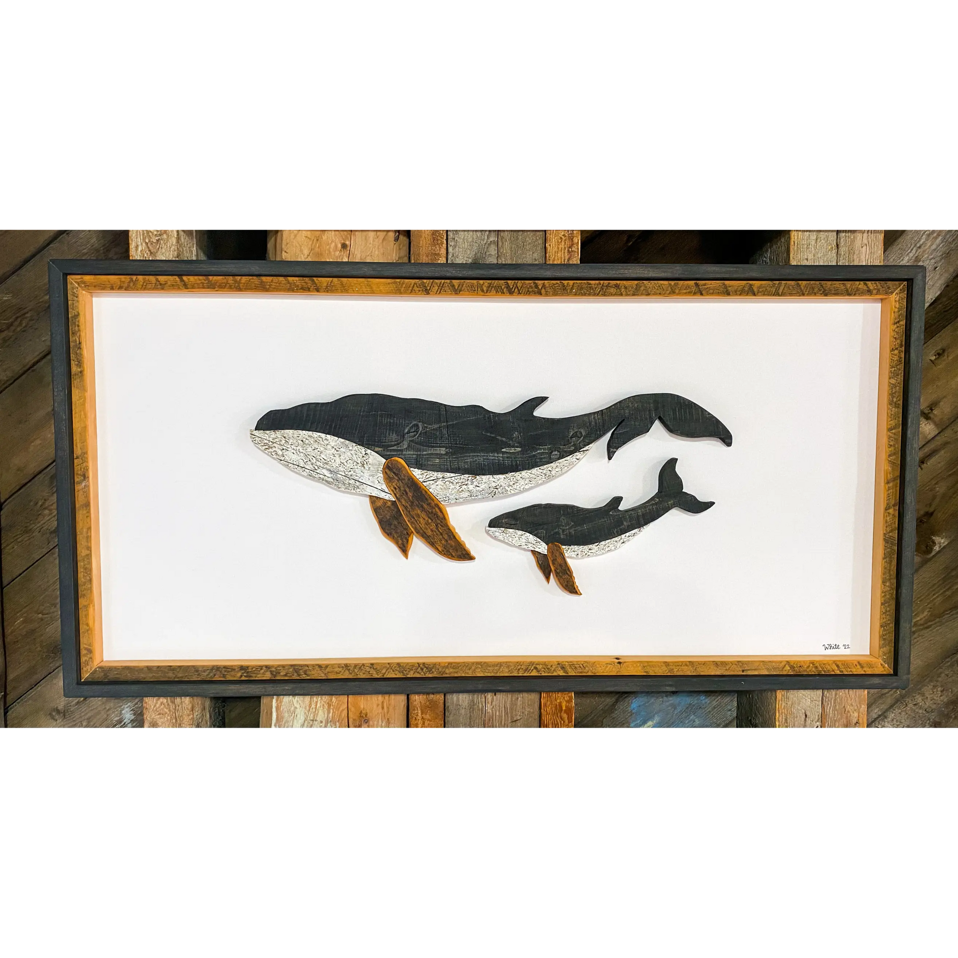 The White's Emporium's "The Mother- Water Street Series" driftwood art piece features two humpback whales made from reclaimed wood and driftwood sourced in Newfoundland.