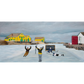Experience the joy of winter in rural Newfoundland with "Still Got It" print. This reproduction features people playing hockey outside.
