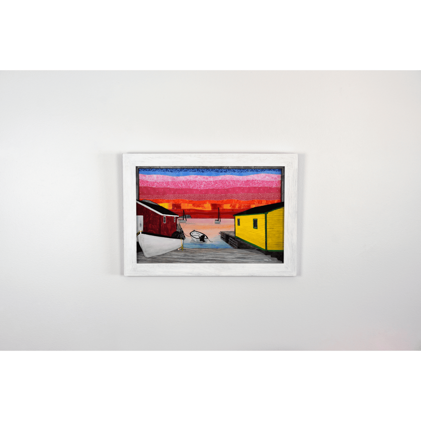 "Back Harbour Sunset" is a reproduction print showcasing a picturesque view of Twillingate's sunset with fishing boats and a colourful sky.