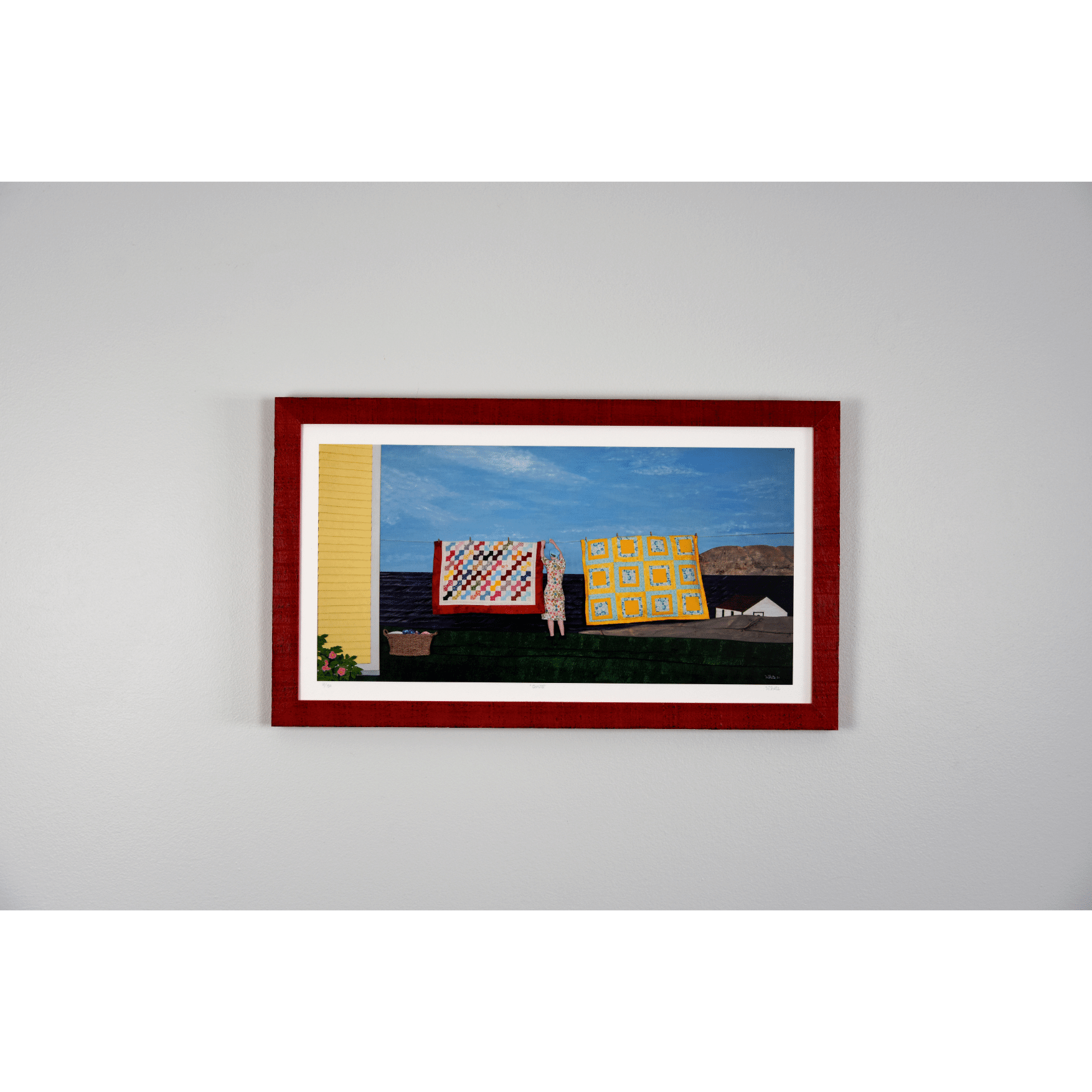 "Quilts" print features a woman in a yellow dress hanging quilts with the ocean and Twillingate coast in the background.