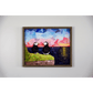  "The Perfect View" reproduction print showcases two puffins perched on a coastal rock, gazing lovingly at each other while enjoying a sunset over the ocean.